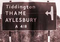 Sign to the A418 with an unusual arrow symbol. Click to enlarge