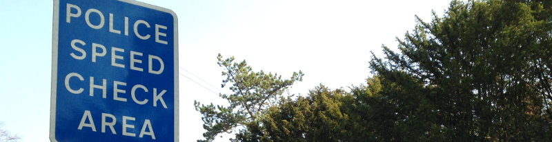 The police still carry out speed patrols, as indicated by this "police speed check area" sign. Click to enlarge