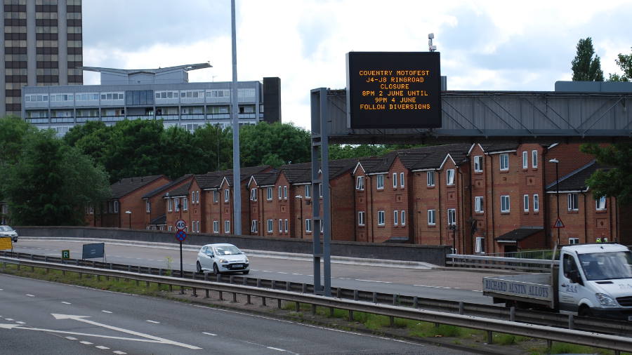 When these pictures were taken, a message about an upcoming event was alternating with the direction sign.