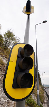 Yellow signal heads are now standard for ramp metering sites. Click to enlarge