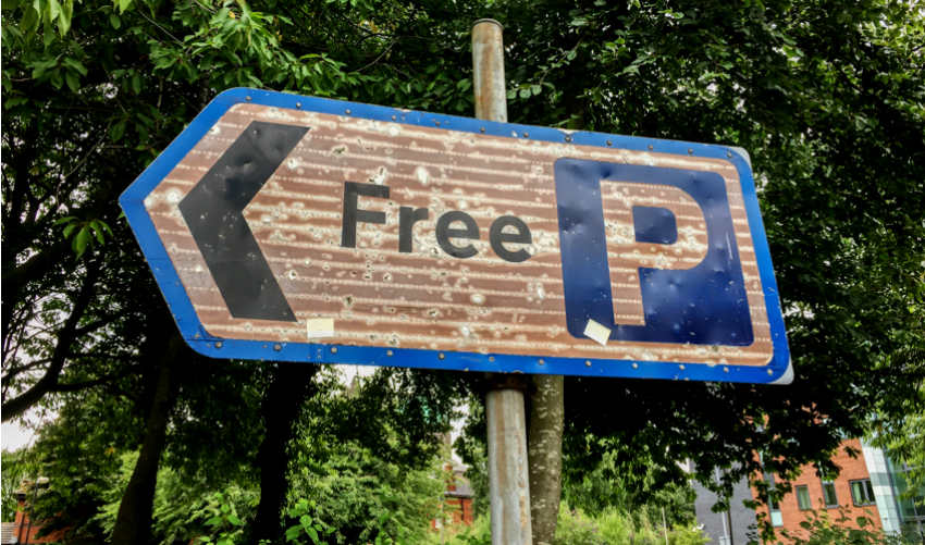 Free Parking starts our rogue's gallery of now-illegal blue bordered signs in the wild.