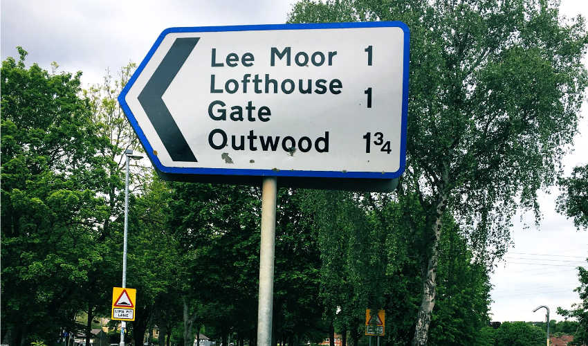 A flag sign near Wakefield that's not yet showing its age.