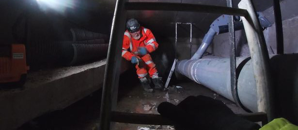 An engineer inside one of the Clifton Bridge's hollow concrete beams. Click to enlarge