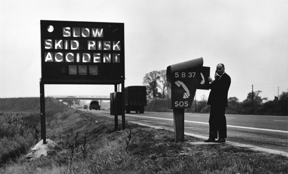 A solidly-built new signal stands beside the M5 in 1964. Click to enlarge