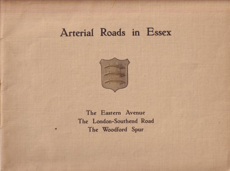 Front cover of a booklet with the title "Arterial Roads in Essex". It is clearly very old, brown with age, and has the crest of Essex below the title