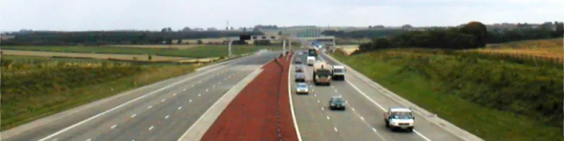 The M1 near Leeds in 2001, just two years after opening, with a tarmac overlay visible in the distance. Click to enlarge