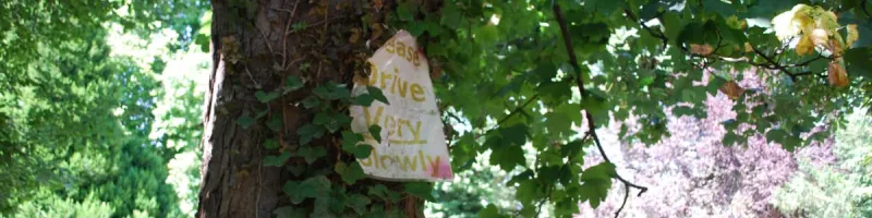 Please drive VERY slowly: good advice on home-made road signs. Click to enlarge