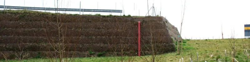 A stump of embankment supporting a stub of road. Click to enlarge