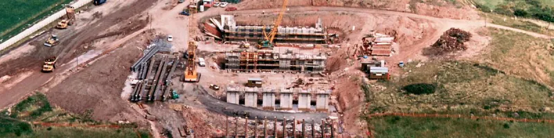 Steelwork is lifted into place across the M61 by two huge mobile cranes. Click to enlarge
