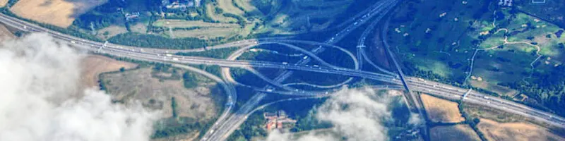 The M11 meets the M25 near Epping. This section was built ten miles east of its intended route; further into London, much of it was never built at all. Click to enlarge