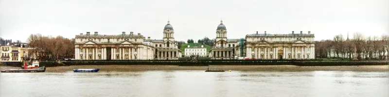 The Old Royal Naval College in Greenwich seen from the river, with the Queen's House and park beyond. Click to enlarge