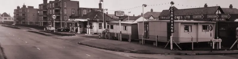 Homes, commercial premises and side turnings on the 70mph Kingston Bypass at Shannon Corner, seen here in 1965. Click to enlarge