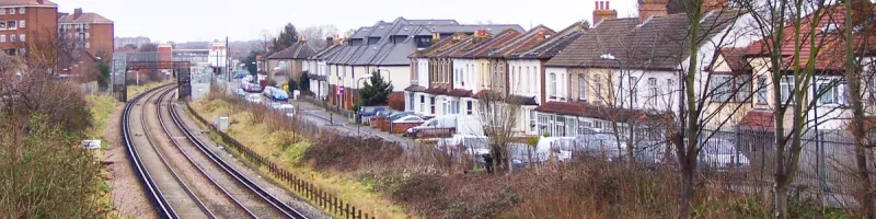 The railway between Mitcham Eastfields and Mitcham Junction. The M23 would have obliterated all of Grove Road, visible here on the far side of the tracks. Click to enlarge