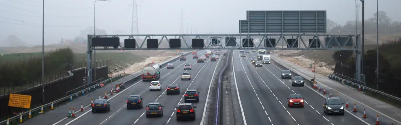 The M25's new junction takes shape through the April drizzle. Even the people who will be allowed to use it aren't allowed to use it yet. Click to enlarge