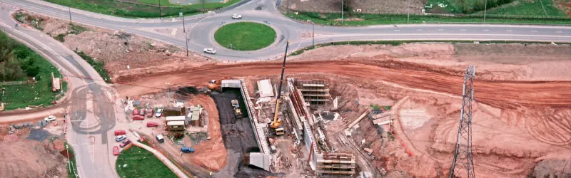 Behind the cones: construction work at Tramway Lane to build a new bridge. Click to enlarge
