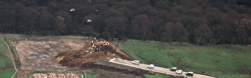 An earthmover surrounded and police out in force: an environmental protest in action. Click to enlarge