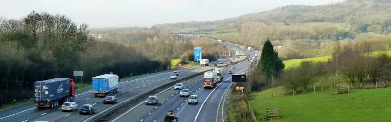 The M25 South Orbital Road near Godstone, with the scenic North Downs beyond. Click to enlarge