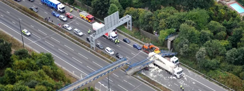 The scene of the bridge collapse, taken from a police helicopter shortly after emergency services arrived. Courtesy NPAS Redhill. Click to enlarge