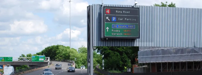 An advance sign for junction 4, complete with a green primary route panel and blue motorway patch. Click to enlarge