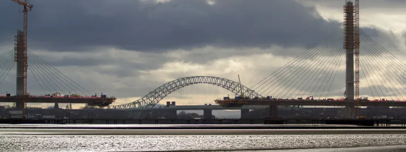 The Mersey Gateway Bridge, seen here in March 2017 with the deck still incomplete, and the Silver Jubilee Bridge in the distance behind it. Click to enlarge