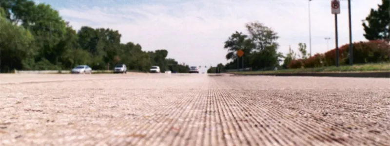 A concrete road after diamond grinding, with distinctive finely ridged surface. Click to enlarge