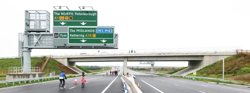 Green signs for an A-road, seen just east of the Great Ouse Viaduct during a charity event shortly before the new A14 opened. Click to enlarge
