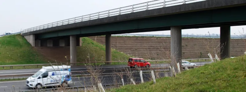 An older bridge of a completely different style, intended for a bridleway and appropriated for a roundabout. Click to enlarge