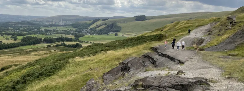 Broken fragments of road cascade down the hillside. Click to enlarge