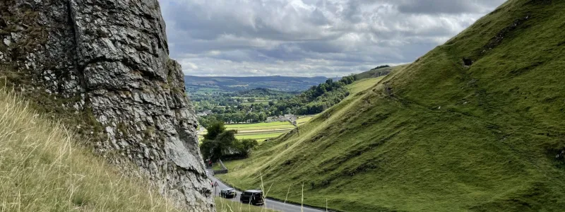 Limestone rocks frame the view along the valley past Castleton towards Hope. Click to enlarge