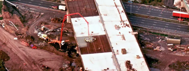 Concrete pouring and levelling in progress at the long viaduct over the M6. Click to enlarge