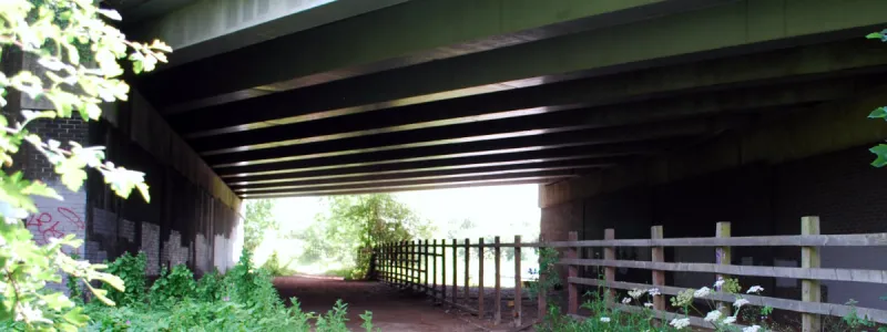 A spare bridge span, wide enough for a two-lane sliproad with hard shoulder, below the A41. The M1 is to the right. Click to enlarge