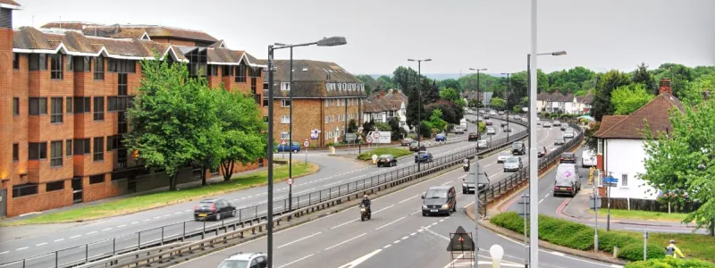 The upgraded Kingston Bypass at Coombe Lane, a six lane expressway squeezed between the semi-detached houses. Click to enlarge