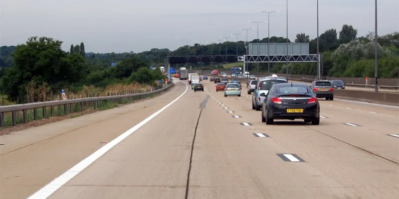 The M25 in Surrey, with a surface it would be charitable to call "awful". Click to enlarge