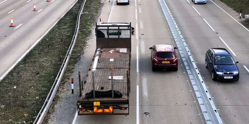 The refurbished London-bound carriageway, with new road markings, rebuilt verges, markerposts and a semi-permanent barrier. Click to enlarge
