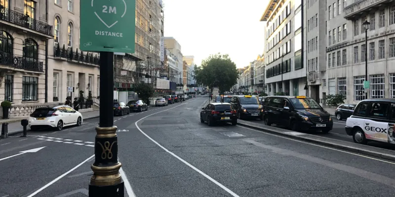 A brand new cycle lane on Langham Place, where previously there was one super-wide general traffic lane. Click to enlarge