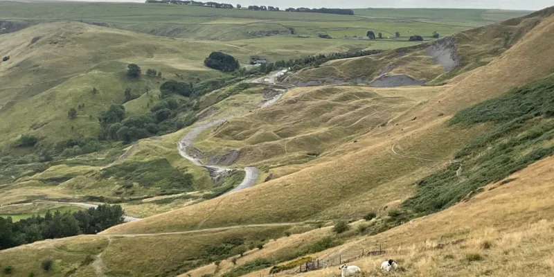 The view across the unstable ground, with the former A625 passing through. Click to enlarge