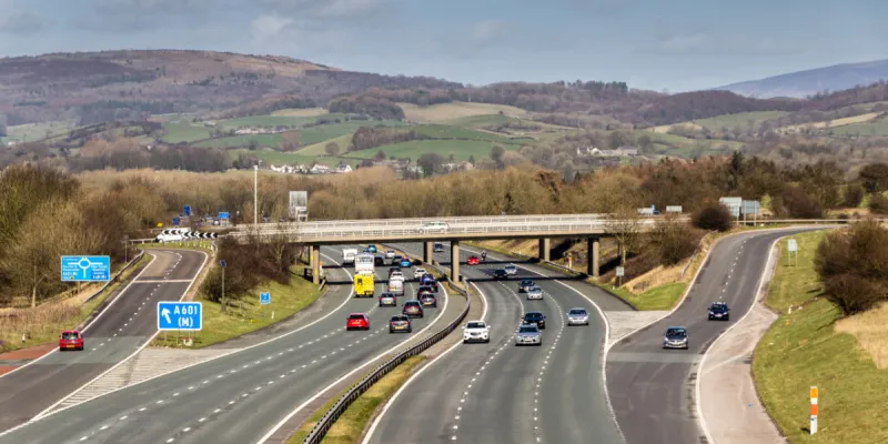 Carnforth Interchange, and the A601(M)'s midway roundabout, seen from the M6. Click to enlarge