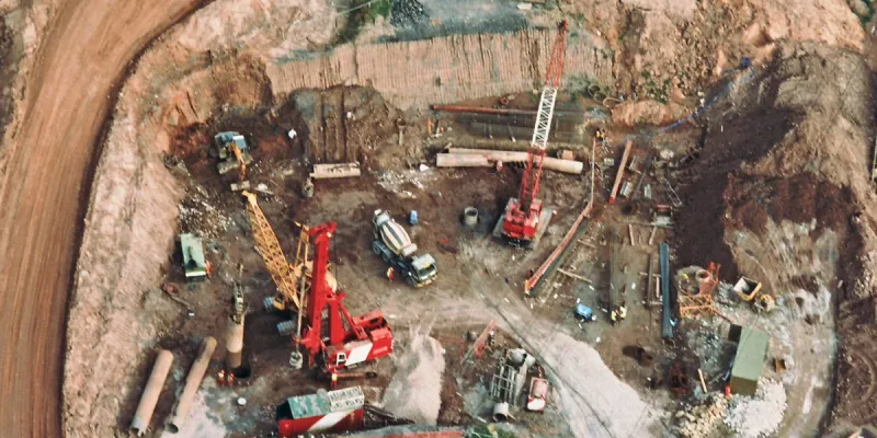 Pile driving at Tramway Lane. Hard hats required. Click to enlarge