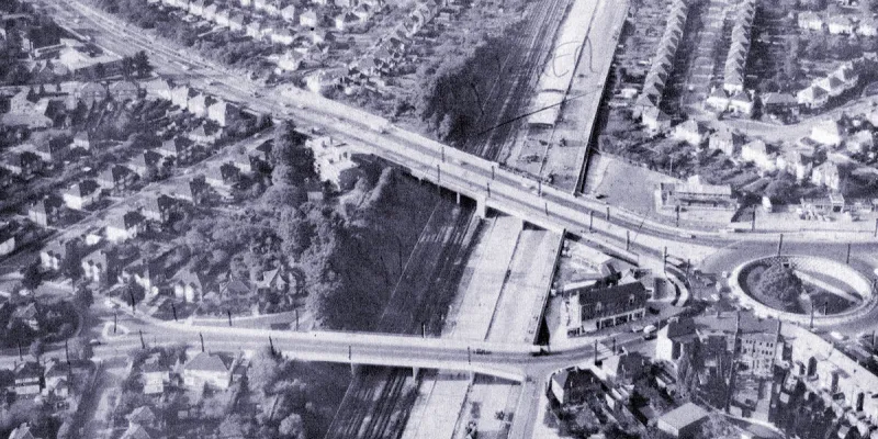 The M1 nearing completion through Edgware, with the A41 crossing at an angle. The setting is decidedly urban. Click to enlarge
