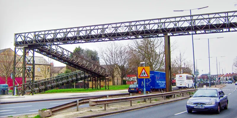 A temporary footbridge, dating from about 1973, still standing on the A316 near Manor Circus. Click to enlarge