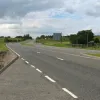 North of junction 11 the former road continues as it once did, as a full dual carriageway, even if there is no-one to use it! Facing northwards the B7078 climbs another hill, with its old fashioned dual-carriageway design.