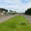 Southwards, a pub is the only active inhabitant of the old road at this point.