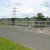 The long abandoned portakabins on the east side of the B7078. One assumes they were part of an M74 construction site.