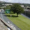 North from that bridge, the central reservation is suddenly wide enough for a considerable expanse of grass and trees. There is already space for a dual carriageway down the middle - the merge here would have been very brief.