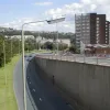 The streetlights on this section are original to the road - 1973 vintage. The road visible here would have been a sliproad between other roads rising in different directions on either side.