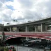 Looking north-west, the new viaducts are juxtaposed with the Victorian river crossing at a lower level. The westbound viaduct actually passes over one end of it.