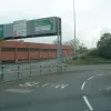 Nope, they're for the four lanes to our left! We continue around to the right to...