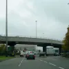 Around the roundabout now, we're facing north, about to pass back under the flyover.