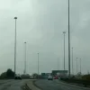 On the flyover through junction 3, it's pretty clear that high mast lighting is in fashion here in Coventry. Up ahead are the gantry signs for junction 4.