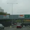 The exit for junction 6. Straight ahead, the gantry over the left hand lane (always signed for the next exit) has some variable message panels. The top part is for parking information; the bottom two lines are accompanied by an 'information' symbol and on this occasion helpfully read "watch your speed".
